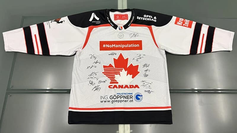 20251215 Signiertes CAN-Trikot Auktion White Ribbon